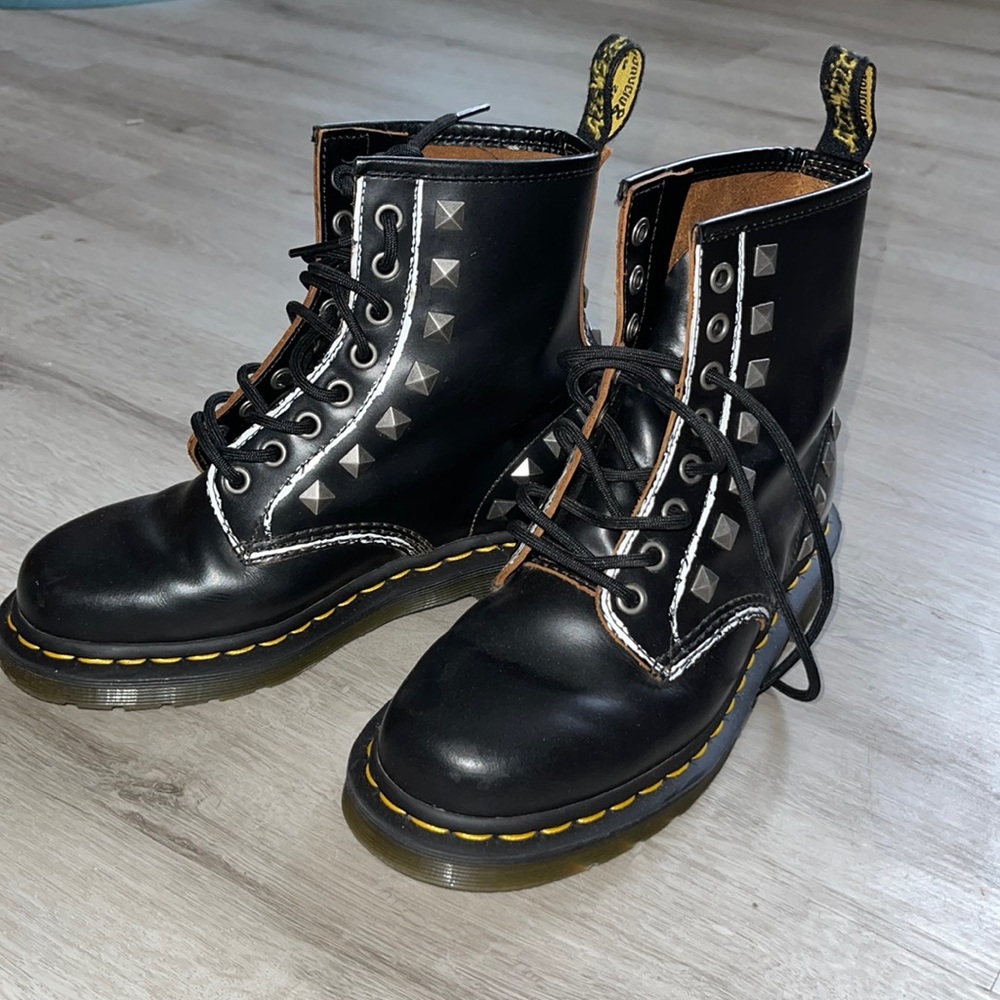 Dr. Martins black 1460 stud boot size 6W (fits a little tighter than most docs)